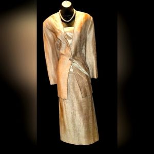 Two piece skirt suit.